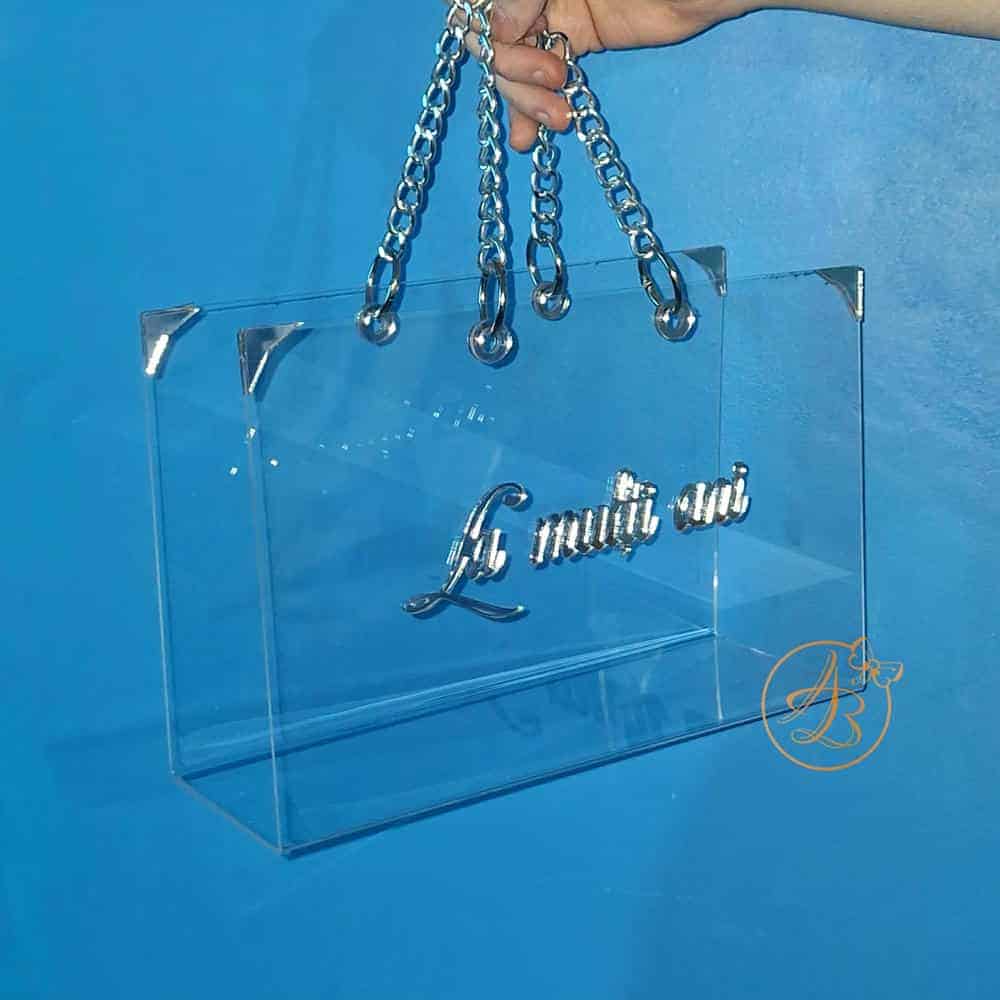 Poseta, geanta medie din plexiglass transparent cu maner argintiu