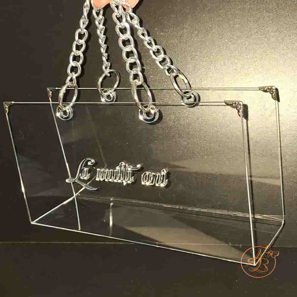 Poseta, geanta mijlocie din plexiglass transparent cu maner argintiu